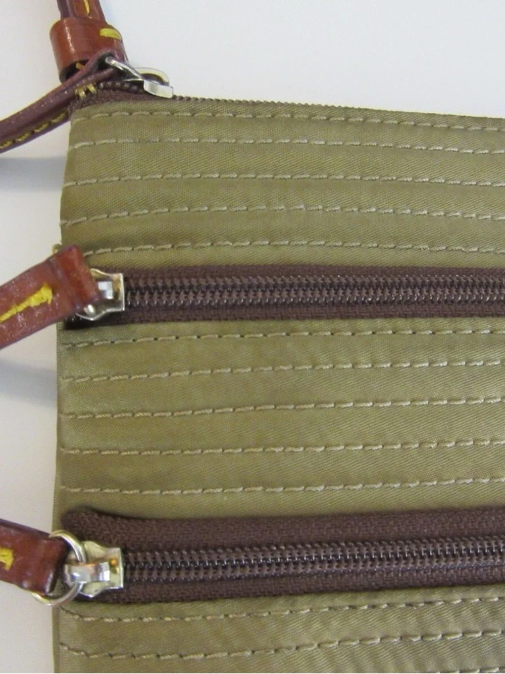 Olive Green Dooney & Bourke Crossbody  Bag with Brown Trim
